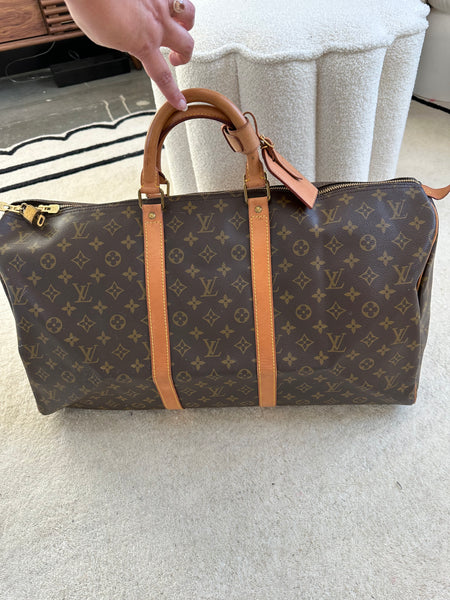 Louis Vuitton Monogram Keepall 55 Boston travel handbag